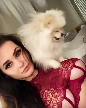 Dog on her boob