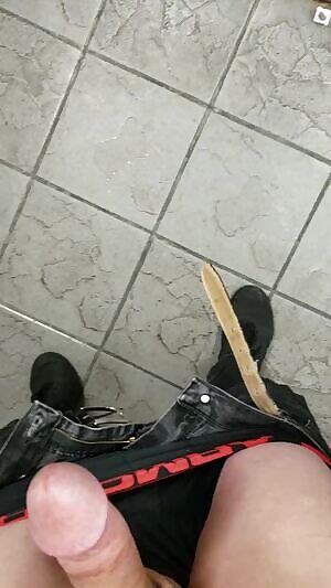 At work bathroom opening door.